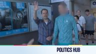 Robert Jenrick confronting passengers