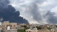 Smoke billows after Israel struck a power station and Sanaa International Airport, in Sanaa, Yemen. Pic: Reuters