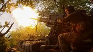 A serviceman of the 43rd Separate Artillery Brigade of the Ukrainian Armed Forces fires a 2S7 Pion self-propelled gun toward Russian positio