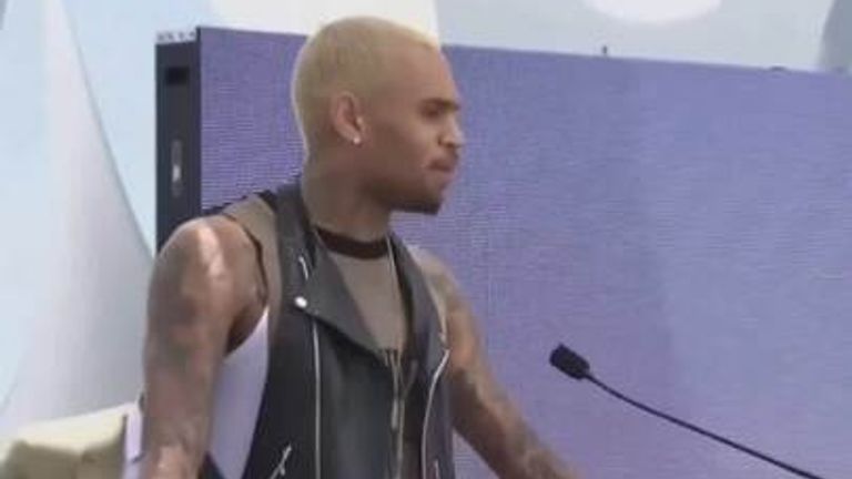 Rapper charged with GBH - after singer Chris Brown remanded in custody over 'bottle attack'