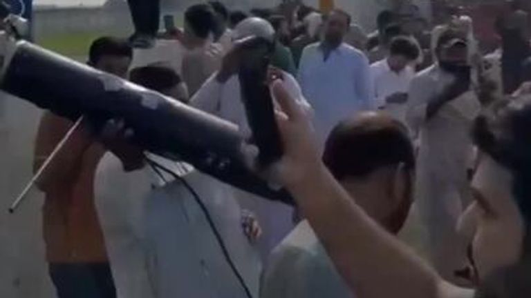 Crowd carries downed drone in Pakistan