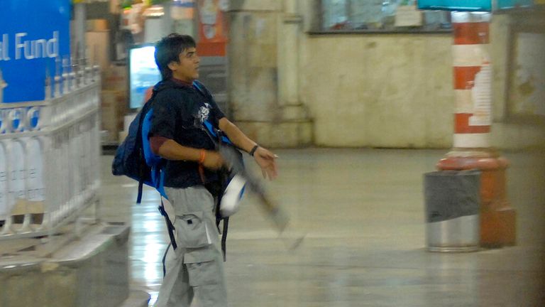 Pakistani terrorist Ajmal Kasab walks through the Chatrapathi Sivaji Terminal railway station during the Mumbai attack in 2008. Pic: AP