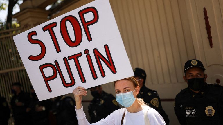 An activist at an Amnesty International demonstration in Mexico City in March 2022 as part of a Global Day of Action for Ukraine. Pic: Reuters