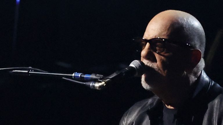 Billy Joel captures the crowd with his soulful piano melodies.