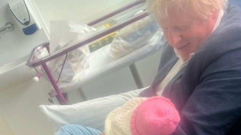 Boris Johnson with his new daughter Poppy Eliza Josephine Johnson. Pic: Carrie Johnson/Instagram