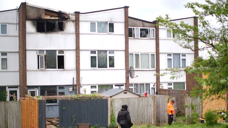 Two terraced houses in Tillett Close, Stonebridge, were involved in the fire. Pic: PA
