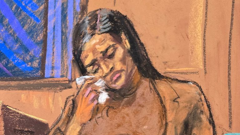 Sean "Diddy" Combs watches as former girlfriend Casandra "Cassie" Ventura reacts during testimony to prosecutor Emily Johnson at Combs' sex trafficking trial in New York City, New York, U.S., May 13, 2025 in this courtroom sketch. REUTERS/Jane