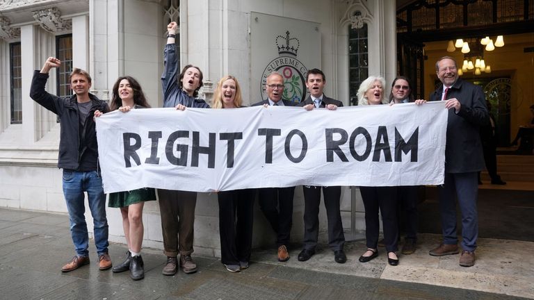 MPs Simon Opher (centre), Phil Brickell (fourth right), Caroline Voaden (third right) and Andy MacNae (right) outside the Supreme Court. Pic: PA