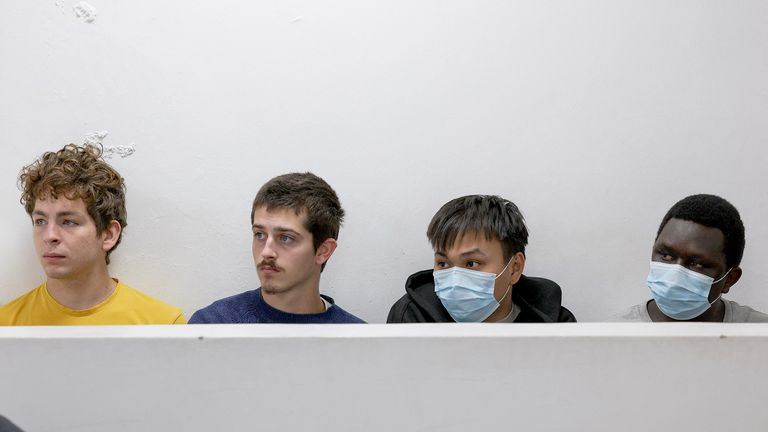Belgium nationals David Lornoy and Seppe Lodewijckx with Vietnamese national Duh Hung Nyugen and Kenyan Dennis Ng'ang'a sit in court during their sentencing.
Pic: Reuters