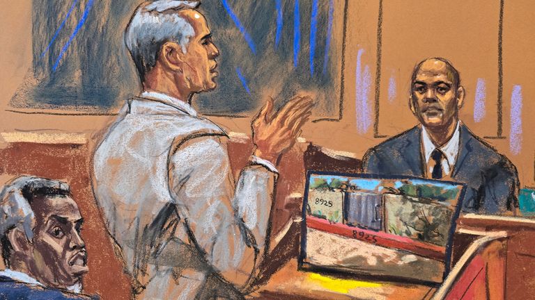 Sean "Diddy" Combs watches as his defence lawyer cross-examines LAPD officer Christopher Ignacio at Combs' sex trafficking trial. Pic: Reuters