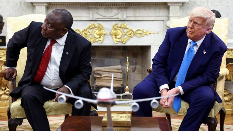 President Trump and President Ramaphosa look towards a screen where videos were played. Pic: Reuters