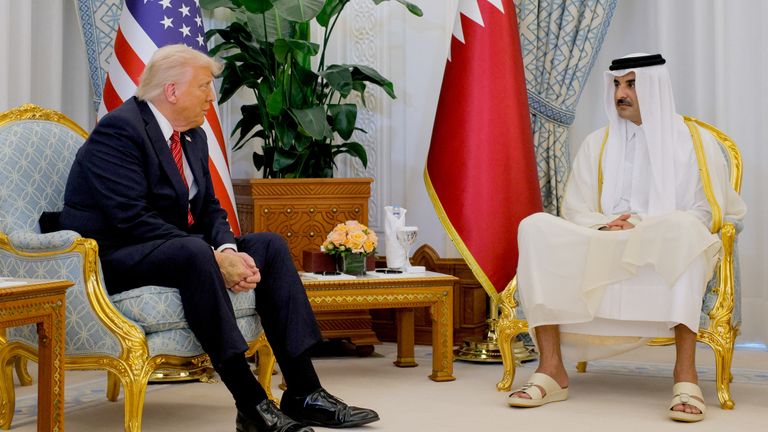 Donald Trump meets Qatar's Emir Tamim bin Hamad Al Thani, in Doha, Qatar.
Pic: Reuters