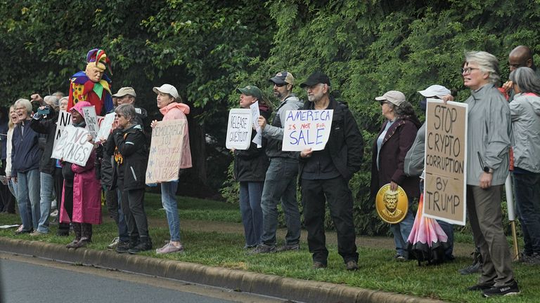Demonstrators gather outside Trump National Golf Course ahead of U.S. President Donald Trump’s meme coin gala.
Pic: Reuters