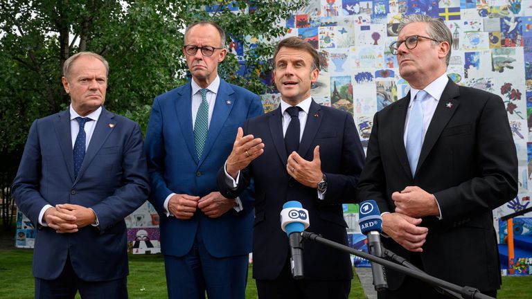 Donald Tusk, Friedrich Merz, Emmanuel Macron and Keir Starmer talk to the press after their meeting.
Pic: Reuters