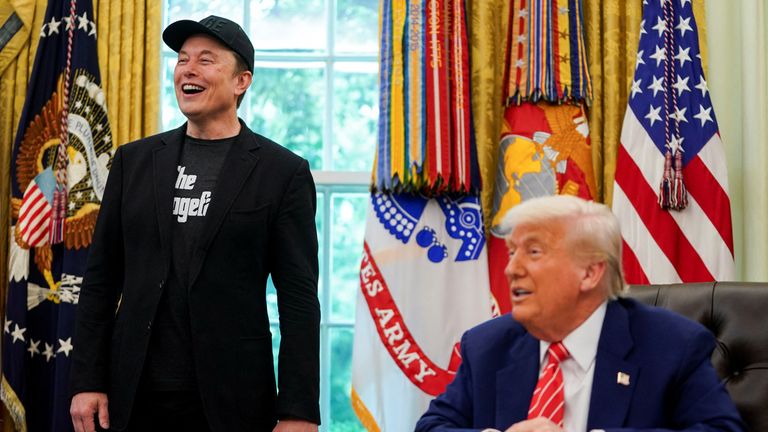 Elon Musk and Donald Trump laugh in the Oval Office, 30/05/25. Pic: Reuters