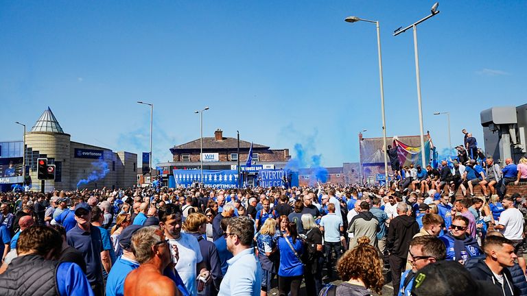 Fans outside the ground before the game. Pic: PA