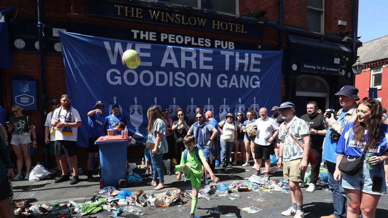 Fans in the street before the game. Pic: Reuters