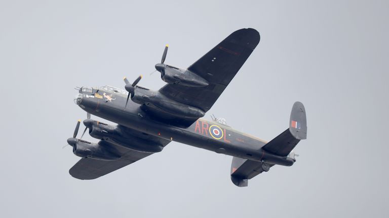 A Lancaster Bomber taking part in the  flypast.
Pic: MOD/PA