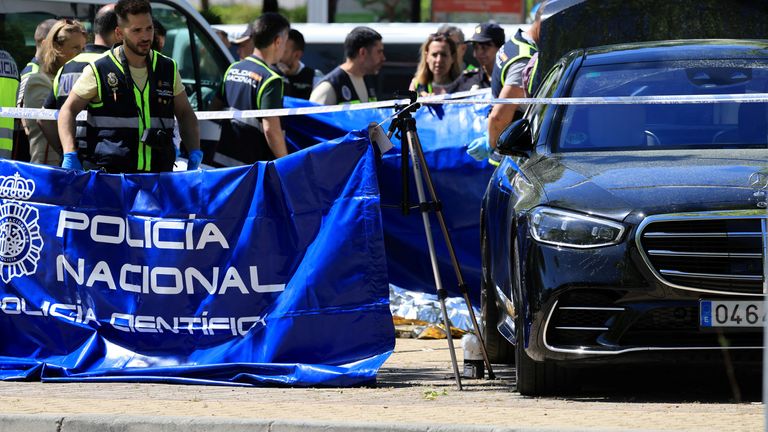 Members of the forensic team work at the scene where former Ukrainian politician Andriy Portnov  was shot by unidentified gunmen.
Pic: Reuters