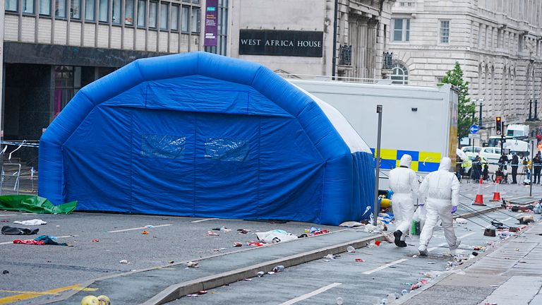 Forensic officers at the scene in Water Street.
Pic: PA