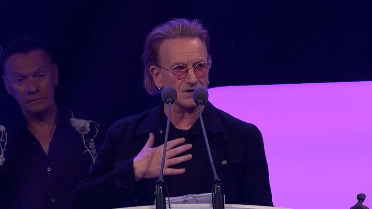 Still of Bono speaking at the Ivor awards 