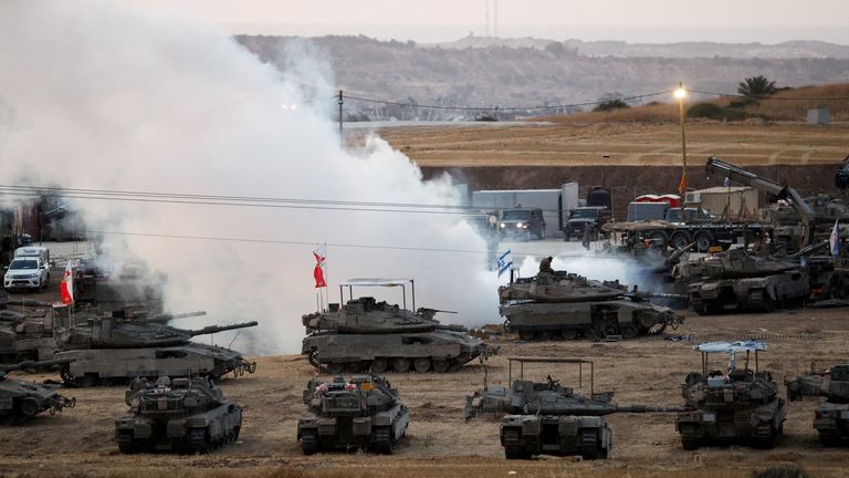 Israeli military vehicles stand near the Israel-Gaza border, in Israel, May 15, 2025. REUTERS/Amir Cohen