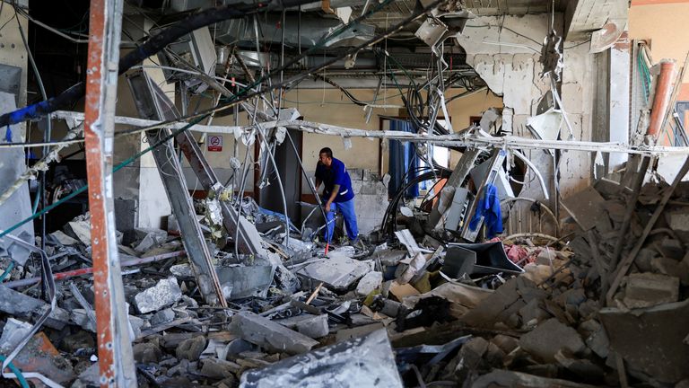 A person inspects Nasser Hospital a part of which was damaged in the aftermath of an Israeli strike, according to Gaza Health Ministry, in Khan Younis, in the southern Gaza Strip, May 13, 2025. REUTERS/Hatem Khaled TPX IMAGES OF THE DAY