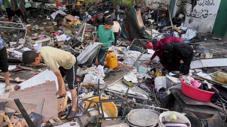 Palestinians inspect the damage at school used as a shelter by displaced residents that was hit by Israeli military strike and killed at least 36 people in Gaza.
Pic: Reuters
