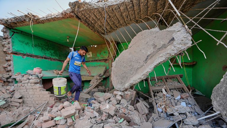 A house damaged from Pakistani artillery shelling in Kotmaira village, in the Akhnoor Sector, India. Pic: AP