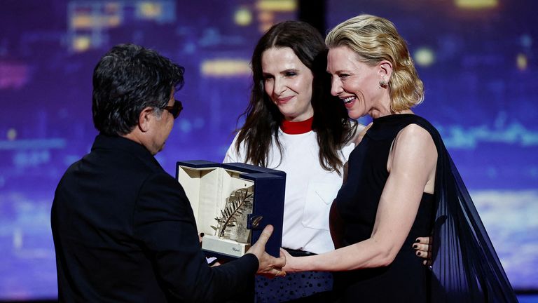 Director Jafar Panahi receiving the Palme d'Or at the 78th Cannes Film Festival