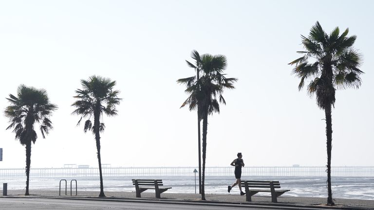A jogger runs along the sea front in Southend-on-Sea, Essex. Thursday is expected to be the hottest day of the year so far, with forecasters predicting temperatures could hit 30C at the earliest point on record. Picture date: Thursday May 1, 2025. PA Photo. See PA story WEATHER Warm. Photo credit should read: Stefan Rousseau/PA Wire