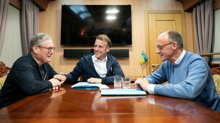 Britain's Prime Minister Keir Starmer meets with French President Emanuel Macron and German Chancellor Friedrich Merz on board a train to the Ukrainian capital Kyiv where all three will hold meetings with Ukrainian President Volodymyr Zelensky, May 9, 2025. Stefan Rousseau/Pool via REUTERS