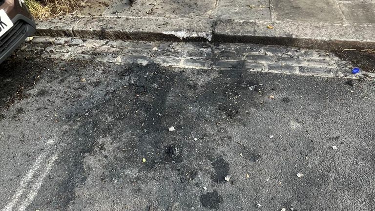 Apparent evidence of a fire on the street 