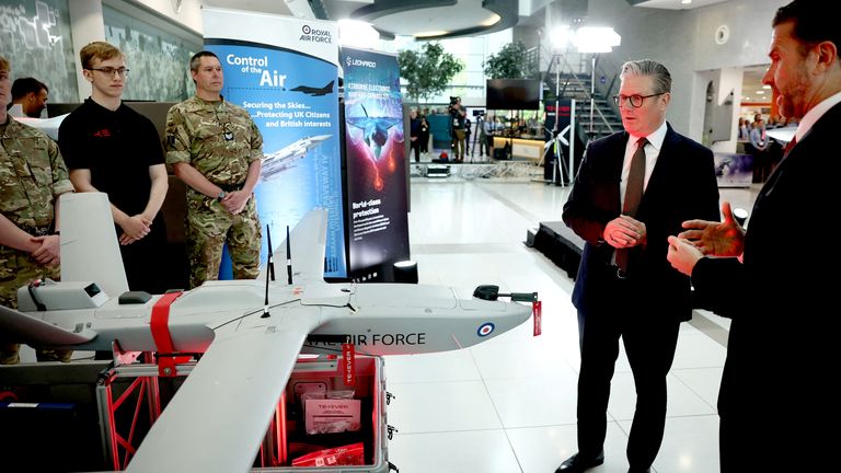 Sir Keir Starmer is shown a new autonomous drone, the "StormShroud", during a visit to a defence contractor in Bedfordshire. Pic: Reuters