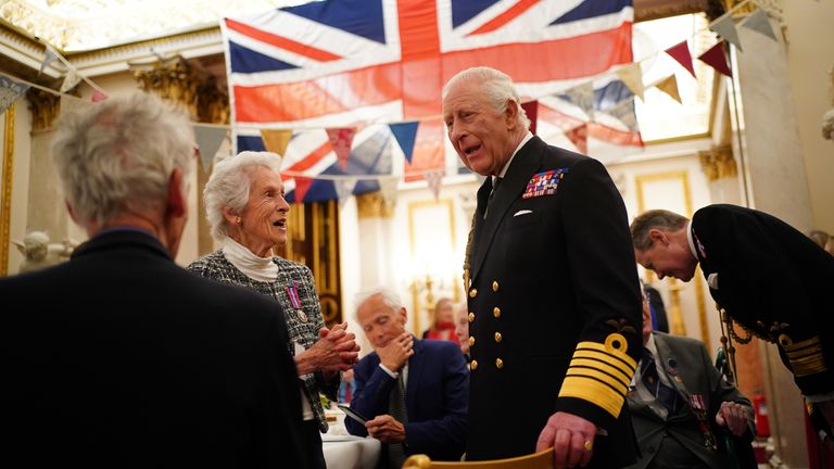 King Charles III (centre right) joins Second World War veterans at a tea party in Buckingham Palace, central London, following the military procession to mark the 80th anniversary of VE Day. Picture date: Monday May 5, 2025.
