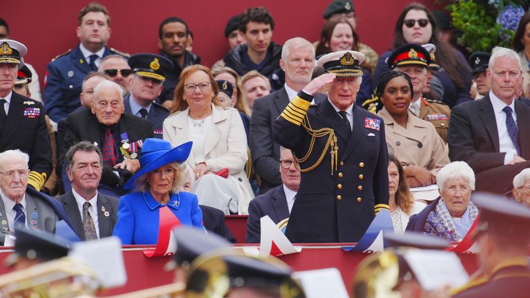PABest King Charles III takes the salute from the military procession marking the 80th anniversary of VE Day, and in honour of those who served during the Second World War, at Buckingham Palace in central London. Picture date: Monday May 5, 2025.


