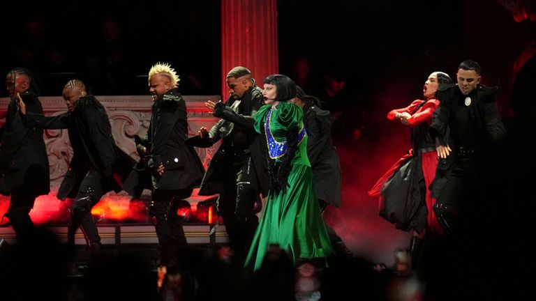 Lady Gaga, centre, performs during her free concert on Copacabana Beach in Rio de Janeiro, Saturday, May 3, 2025. (AP Photo/Silvia Izquierdo)