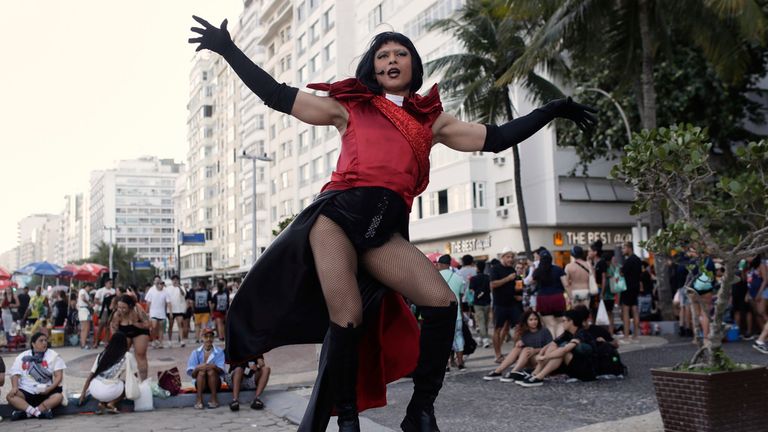 A fan strikes a pose. Pic: AP