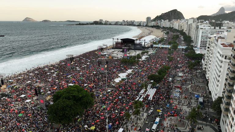 An aerial view shows fans gathering on Copacabana beach ahead of Lady Gaga's arrival. Pic: Reuters