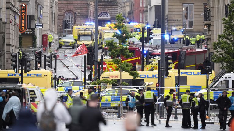 Police and emergency personnel dealing with a road traffic accident on Water Street near the Liver Building in Liverpool after a car collided with pedestrians during the Premier League winners parade. A man has been detained. Picture date: Monday May 26, 2025.