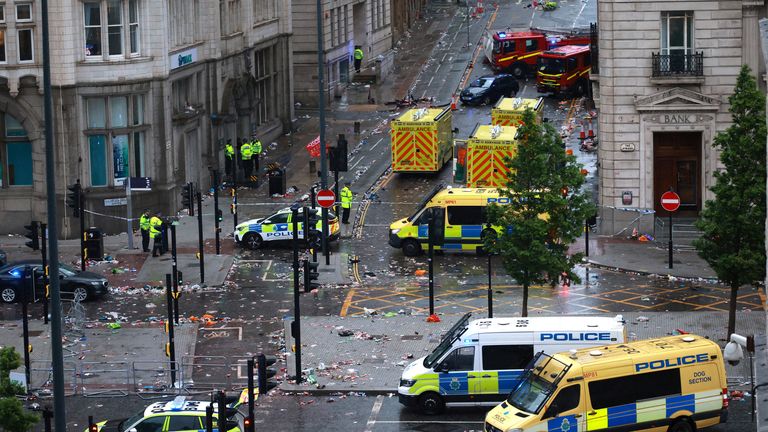 Soccer Football - Premier League - Liverpool Victory Parade - Liverpool, Britain - May 26, 2025 Emergency services at the scene after multiple people were hit by a car during the Victory parade REUTERS/Phil Noble