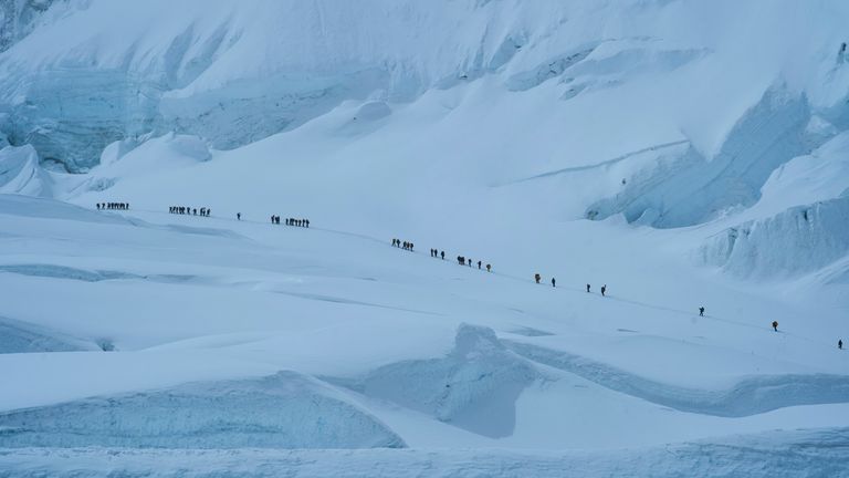 Mountaineers ascend to Camp 2 on their way to the summit of Mount Everest in Nepal, May 1, 2025. (AP Photo/Pasang Rinzee Sherpa)