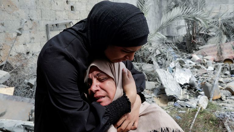 Naima, the grieving mother of Hala Zaarab, a Palestinian newlywed killed in an Israeli airstrike, is comforted as she cries, in Khan Younis.
Pic: Reuters