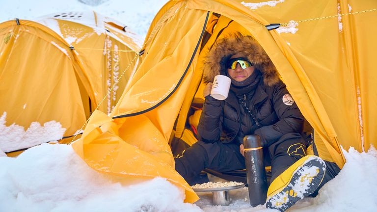 A climber rests early morning inside a tent at the Everest Base Camp in Nepal, Friday, May 2, 2025. (AP Photo/Pasang Rinzee Sherpa)