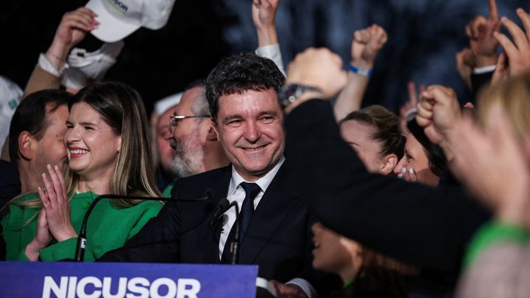 Nicusor Dan and his supporters celebrated the exit polls. Pic: Reuters