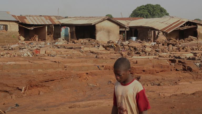 A boy walks past a flooded area after heavy rainfall in the market town of Mokwa, north-central Nigeria, Saturday May 31, 2025. Pic: AP