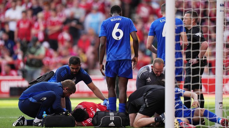 Nottingham Forest's Taiwo Awoniyi receives medical attention after sustaining an injury. Pic: Reuters