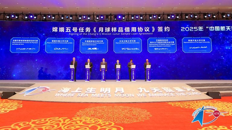 The scientists attended a ceremony in Beijing to collect the samples. Pic: Prof Mahesh Anand / The Open University