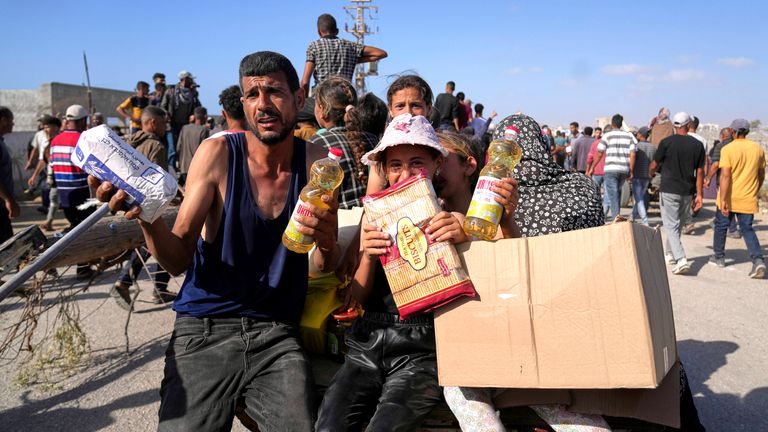 Palestinians with food and humanitarian aid packages they received from the Gaza Humanitarian Foundation, a U.S.-backed group approved by Israel, in Rafah.
Pic: AP