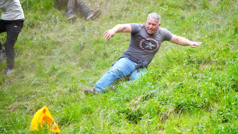 Participants instrumentality     portion  successful  the yearly  food  rolling astatine  Cooper's Hill successful  Brockworth, Gloucestershire. 
Pic PA